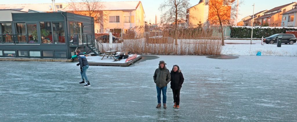 Photo of Cornelia and her husband on a frozen canal.